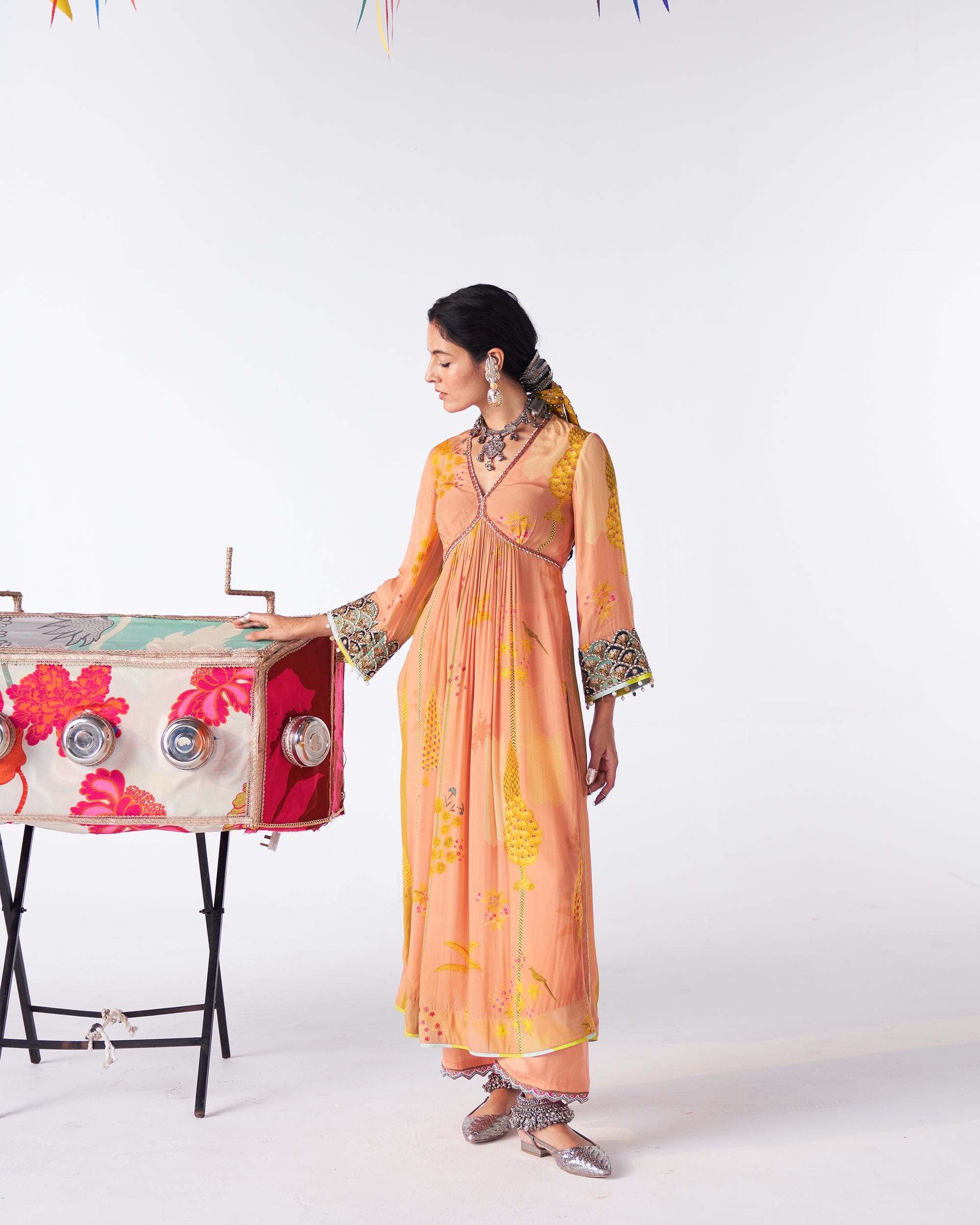 Sakhi Peachish Pink Print Bell Sleeve Kurta Set