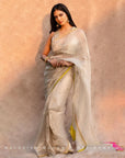 Fariba Ivory Malvika Mohnan Golden Tissue Sari Set